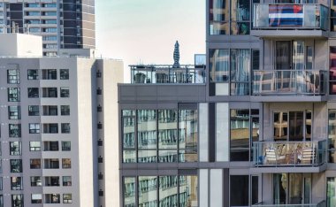 toronto, canada - 24 October 2022: concrete big real estate apartment building in the city with a garden around