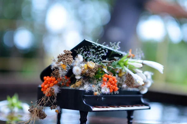 Souvenir piano. Flower Arrangement in piano.