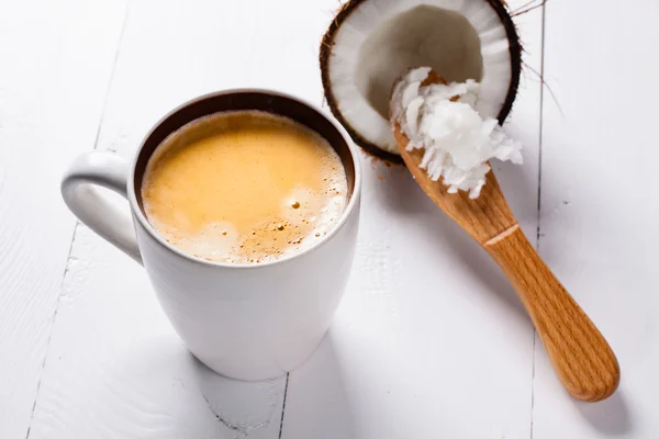 Cup of bullet proof coffee — Stock Photo, Image