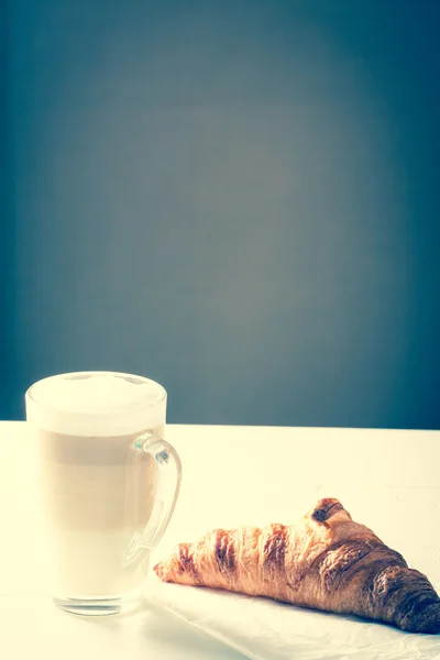 Latte macchiato coffee and croissant for noon time . — Stok Foto