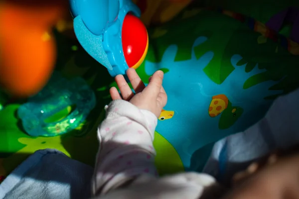 Baby Hand Playing with toys — Stock Photo, Image