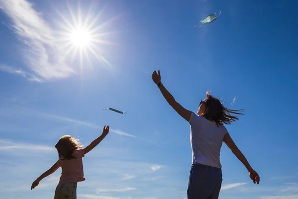 Woman Little Girl Throw Surgical Masks Sign Joy Ending Pandemic — Stock Photo, Image