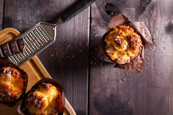 Handmade muffins on wooden background. — Stock Photo, Image