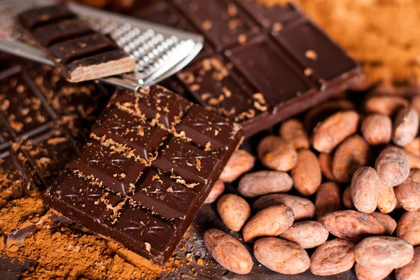 Chocolate products and nuts — Stock Photo, Image