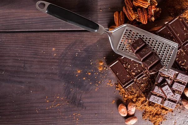 Chocolate products and nuts — Stock Photo, Image