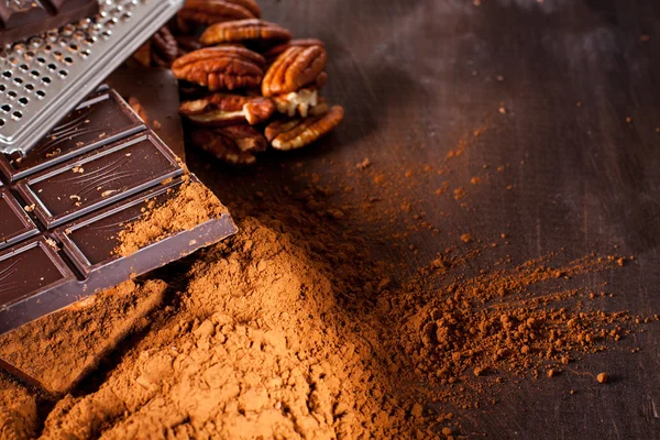 Chocolate products and nuts — Stock Photo, Image