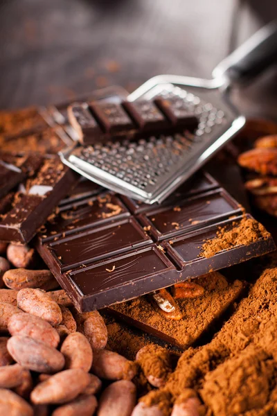 Chocolate products and nuts — Stock Photo, Image