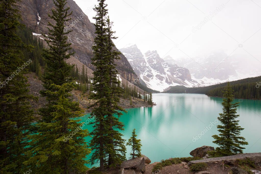 Moraine lake on a rainy and misty day. Alberta, Canada.
