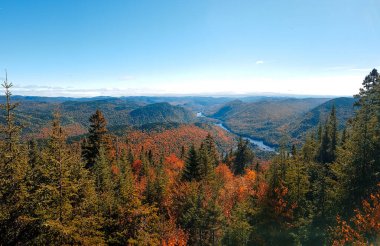 View of the Jacques Cartier parc in Quebec in Autumn clipart