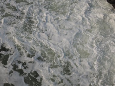 Köpük deniz arka planda beyaz, mavi ve gri karıştırılır