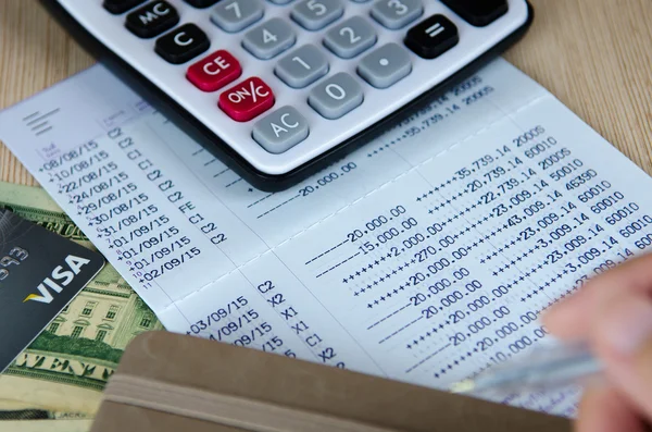 Calculator on bank account passbook