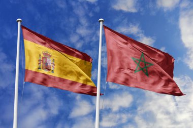 Mavi gökyüzünde dalgalanan İspanya ve Fas bayrakları diplomasiyi, ticareti, stratejik ortaklığı ve birliği simgeliyor.