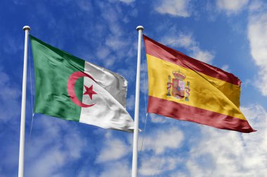 Cezayir ve İspanya 'nın ulusal bayrakları mavi gökyüzüne karşı yan yana sallanarak uluslararası diplomasiyi, ikili ticari ilişkileri, stratejik ortaklığı ve ülkeler arasındaki kültürel değişimi simgeliyor..