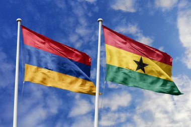 Ulusal Ermenistan ve Gana bayrakları mavi gökyüzüne karşı yan yana sallanarak uluslararası diplomasiyi, ikili ticari ilişkileri, stratejik ortaklığı ve ülkeler arasındaki kültürel alışverişi simgeliyor..