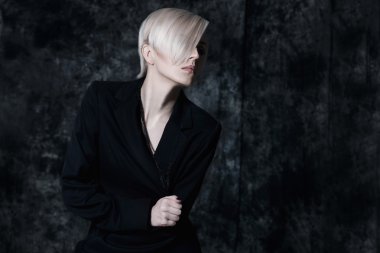 Dramatic portrait of a young blonde woman