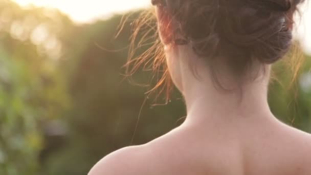 Bride looks back to the camera and smiling — Stock Video