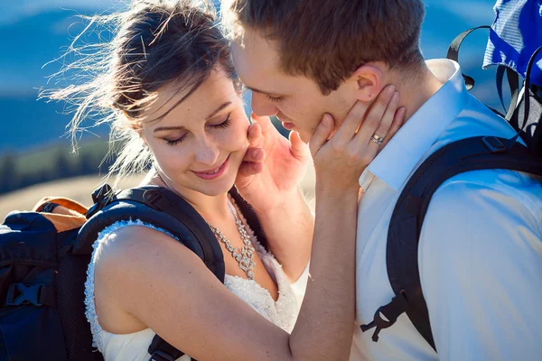 Beautiful wedding couple hugs closeup. Honeymoon in Alps — 图库照片