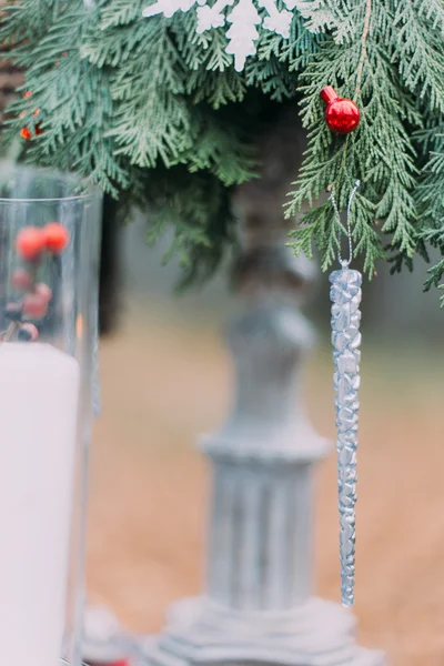 Silver toy icicle on the christmas tree. Cute decorations — Stock Photo, Image