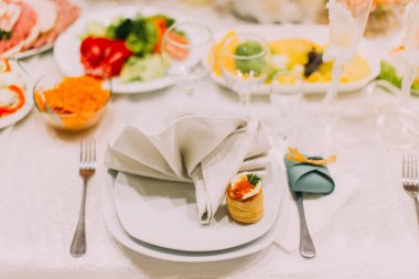 Fancy table set for wedding or another catered event dinner