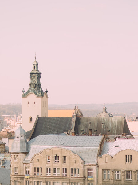 Cityscape with old buildings. Bell tower of Latin Cathedral in Lviv, Ukraine.