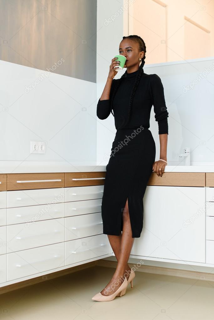 black dress beige shoes