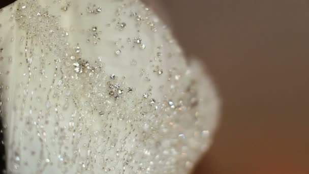 Belle texture brillante robe de mariée gros plan 