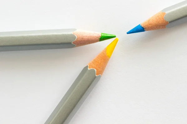 Three pencils: blue, yellow and green — Stock Photo, Image