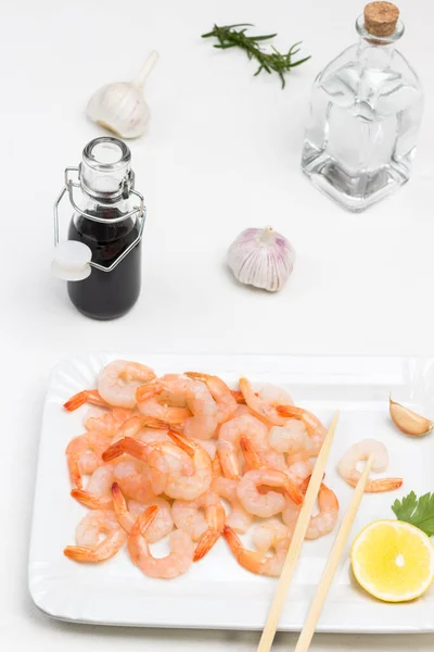 Shrimps Lemon Bamboo Sticks White Plate Soy Sauce Water Glass — Stock Photo, Image