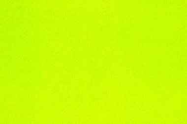 Düz bir yüzeyde parlak neon yüzey. Limon renkli arkaplan.