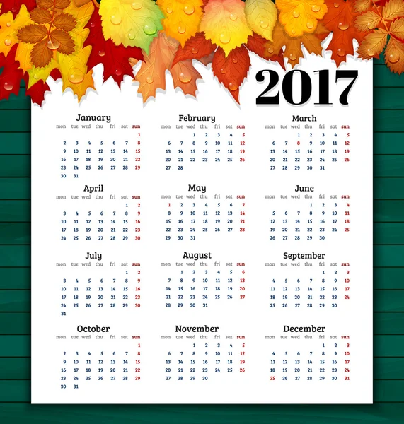 Kalender 2017 med färgglada löv på trä bakgrund vect — Stock vektor