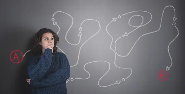 Teenager and a blackboard — Stock Photo, Image