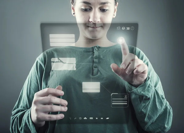 Young girl using virtual screen — Stock Photo, Image