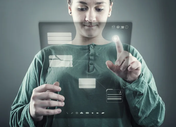 Young girl using virtual screen