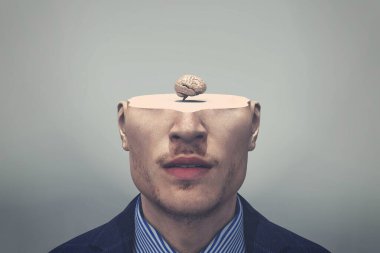 Yarım akıllı ve küçük beyinli bir adam. Kişisel gelişim ve açık fikirlilik. Bu 3 boyutlu bir çizim. . 