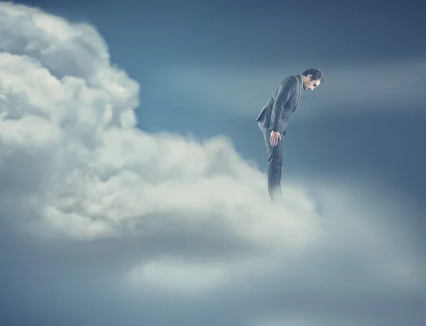 Een man op wolk — Stockfoto