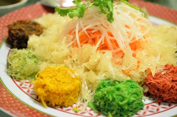 A special dish during Chinese New Year called Yusheng or Yee Sang — Stock Photo, Image