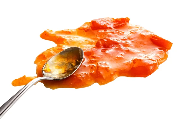 bir kaşık ile dökülen kayısı reçeli
