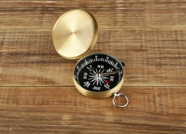 Compass on wooden background — Stock Photo, Image