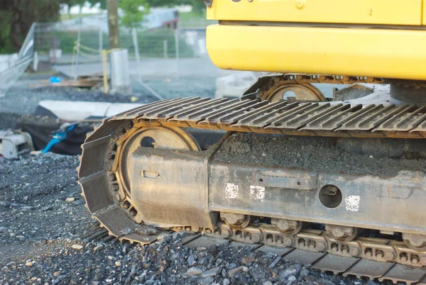 Excavadora amarilla primer plano sitio de construcción herramientas pesadas bulldozer máquina —  Fotos de Stock