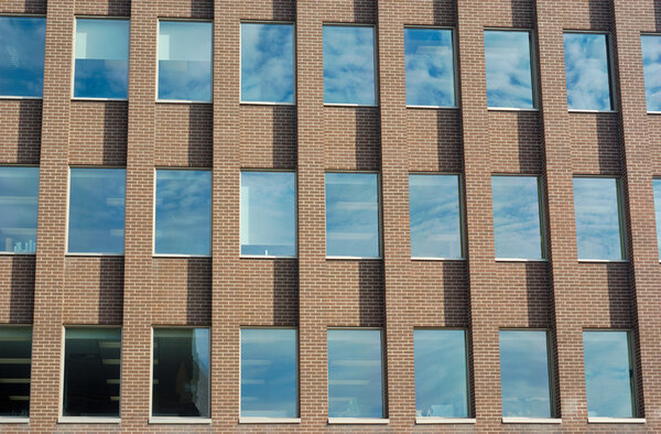Office building facade bricks and windows perspective