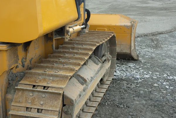 Yellow caterpillar bulldozer closeup excavator — Stock Photo, Image