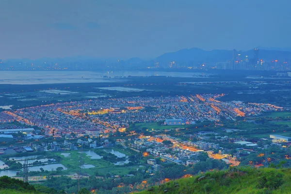 Hong kong yuen lang centrum zonsondergang — Stockfoto