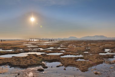 Günbatımı üzerinde Ha Pak Lai 