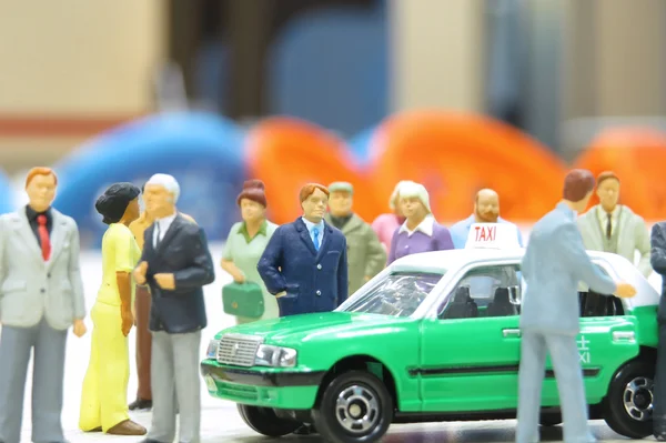 Model taxi a malé postavy — Stock fotografie