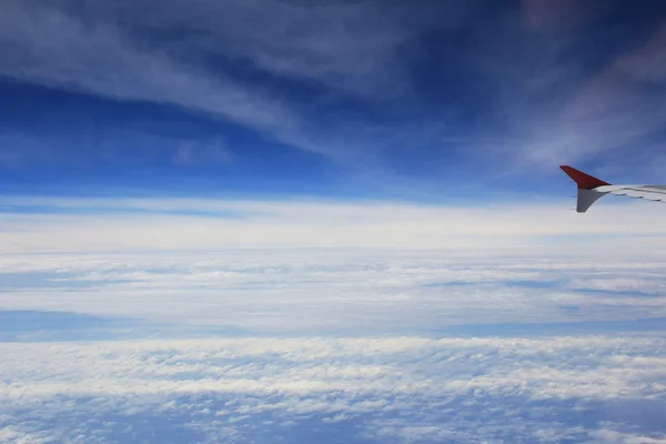 Airplane window, ocean blue — Stock Photo, Image