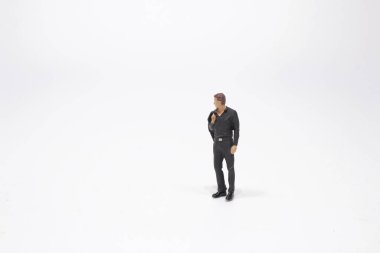 Tahtadaki mini iş figürü.