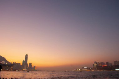 Sunrise day to night shot over Victoria Harbor 30 Jan 2006