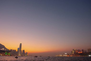 Sunrise day to night shot over Victoria Harbor 30 Jan 2006