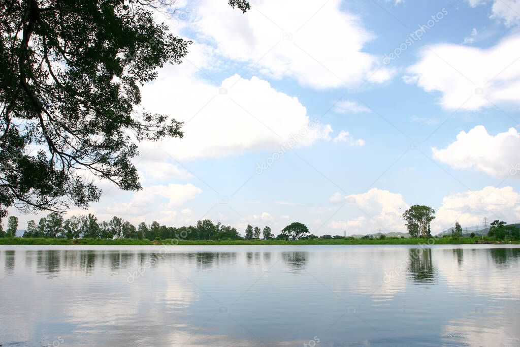 the Reflection of the Kai Kung Leng, at Shan Pui Tsuen fish pond.
