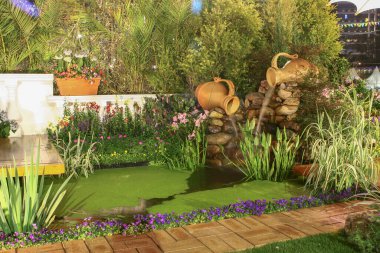 Perfect Backyard Landscaping,  Landscaped Garden Pond